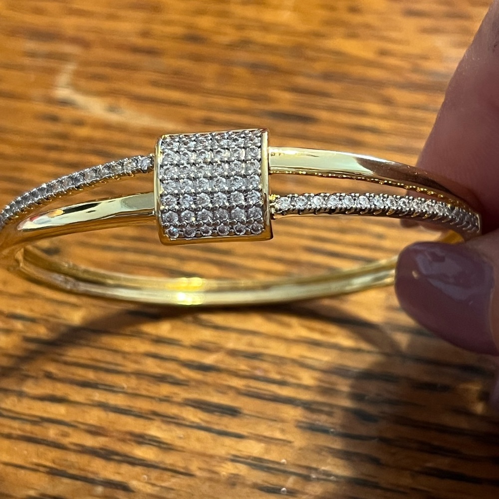 Gold over silver bracelet with AAA cz details. Size 8